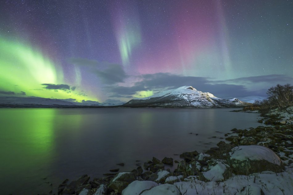 Green and slightly purple auroras above pikku-Malla fell in Kilpisjärvi. 